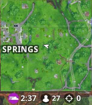 A screenshot of the Fortnite map showing the time for the moving zone and players remaining